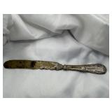VINTAGE SILVER-PLATED OR BRASS CHILDREN'S KNIFE