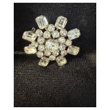 VINTAGE STARBURST BROOCH FEATURING CLEAR