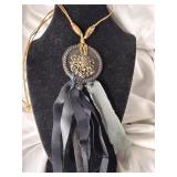 HAND CRAFTED WITH A VINTAGE BROOCH IN THE MIDDLE