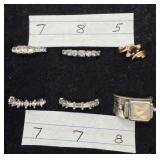 6 FAUX DIAMOND RINGS, SEE PHOTOS FOR SIZE