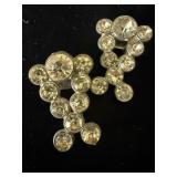 VINTAGE RHINESTONE DRESS CLIPS FEATURING A