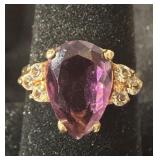 WOMEN'S SIZE 7 RING FEATURING A TEADROP SHAPED