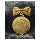 VINTAGE GOLD-TONE PIN LOCKET