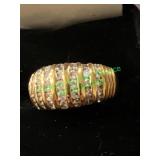 size 8 gold colored and clear stone ring
