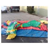 Large bounce house with blower **ripped**