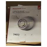 THE ROUND NON PROGRAMMABLE THERMOSTAT