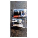 TWO LOCKING PLUGS