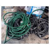 PILE OF WATER HOSES