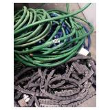 PILE OF WATER HOSES