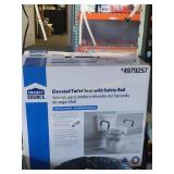 ELEVATED TOILET SEAT WITH SAFETY RAIL
