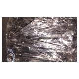 BAG OF PLASTIC IRRIGATION EMMITERS ON STAKES
