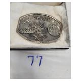 Polished pewter Maine state buckle