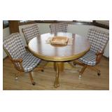 48" Round Oak Table w/ 2 Leaves, 4 Swivel Chairs