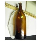 14"h by 4 1/2" dia. Brown Bottle w/ Stopper