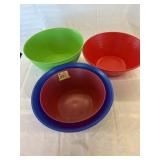 3 LARGE PLASTIC BOWLS AND 1 MEDIUM BOWL