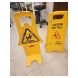 2 caution "wet floor" signs