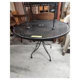 Wrought Iron Patio Table  42' w/4 chairs