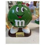 Green M & M candy dispenser