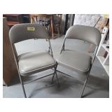 2 padded folding chairs