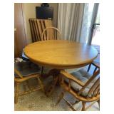 SOLID ROUND OAK TABLE  48" W/6 12" LEAVES