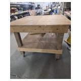 HOMEMADE CARPENTERS TABLE ON WHEELS