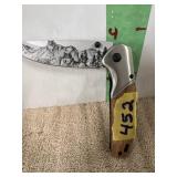 ELITE EGE STAINLESS STEEL W/WOLF ENGRAVING ON