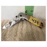 ELITE STAINLESS STEEL W/ELK ENGRAVING ON BLADE