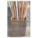 Wooden Yardsticks in Woven Basket