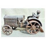 McCormick Deering Cast Iron Toy Tractor w/driver