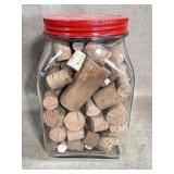 Glass Jar with Red Lid Filled with Corks
