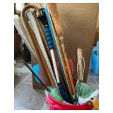 Yardsticks, Canes, Broom, & misc in bucket