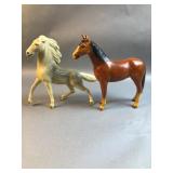 (2)  pottery horses - both have quality issues