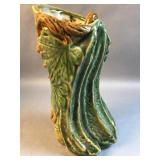 majolica-style pottery vase with tree trunk and