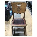 Wooden chair with leather cushion