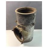 heavy iron stove pipe piece