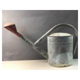 Galvanized metal atering can