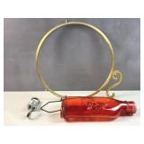 Glass humming bird feeder and hanging frame