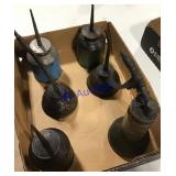 6 oil cans 6 oil cans