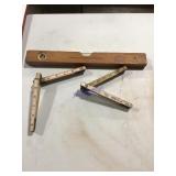 2 folding rulers & unmarked wood level 2 folding rulers & unmarked wood level