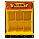 Kikkerland Store Display With Four Music Boxes