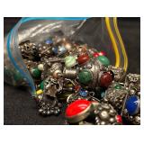 Over a Pound of Mid Century Etruscan Charms