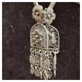 Silverwork Filigree Dangle Earrings with Floral Mo