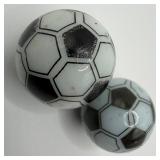 Two Soccer Ball Glass Shooter Marbles Black and Wh