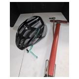 Vintage bicycle pump and helmet