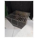 Vintage portable grill folds flat