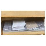 Shelf full of Ceramic Tile Pieces