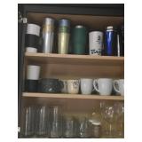 Glasses, cups, and mugs, contents of cabinet