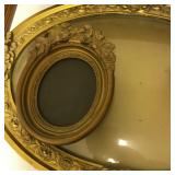 Oval bowed glass frame and small oval frame