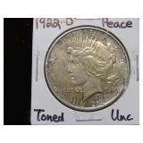 1922 D PEACE SILVER DOLLAR (TONED) 90% UNC