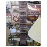 FELLOWES TOWER RACK FULL OF 60 VARIOUS GENRES CD